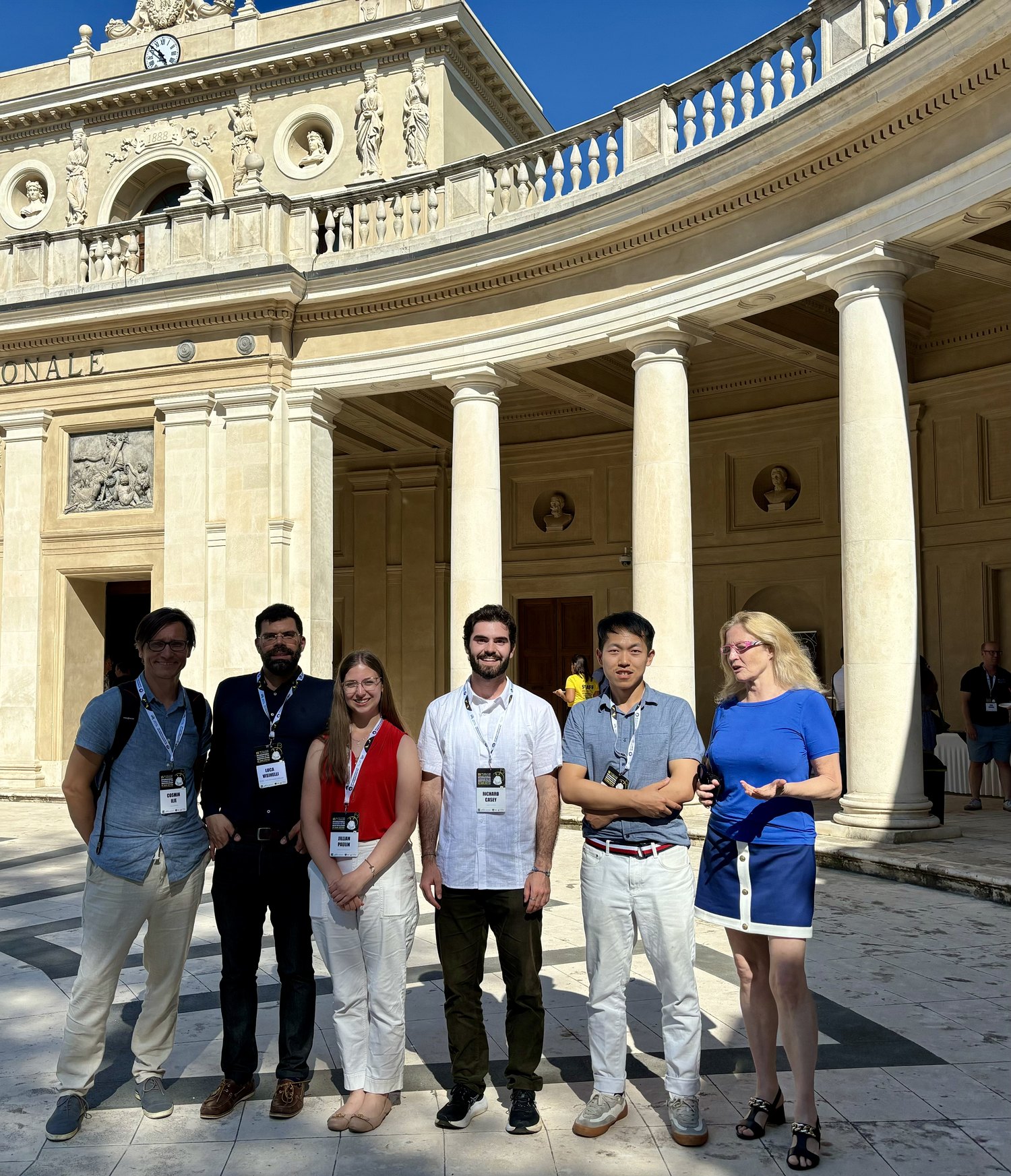 Cosmin Ilie with collaborators and students at the IDM 2024 conference in L'Aquila